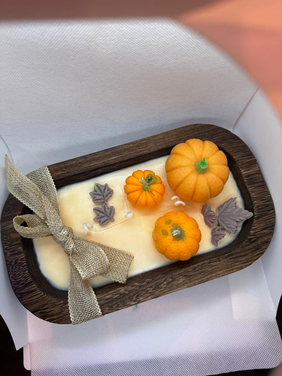 Calabazas en cuenco de madera