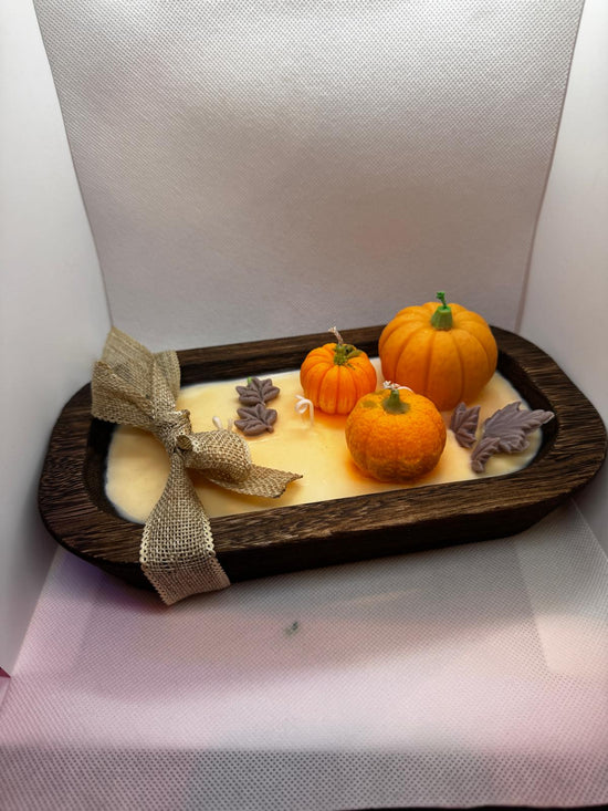 Calabazas en cuenco de madera