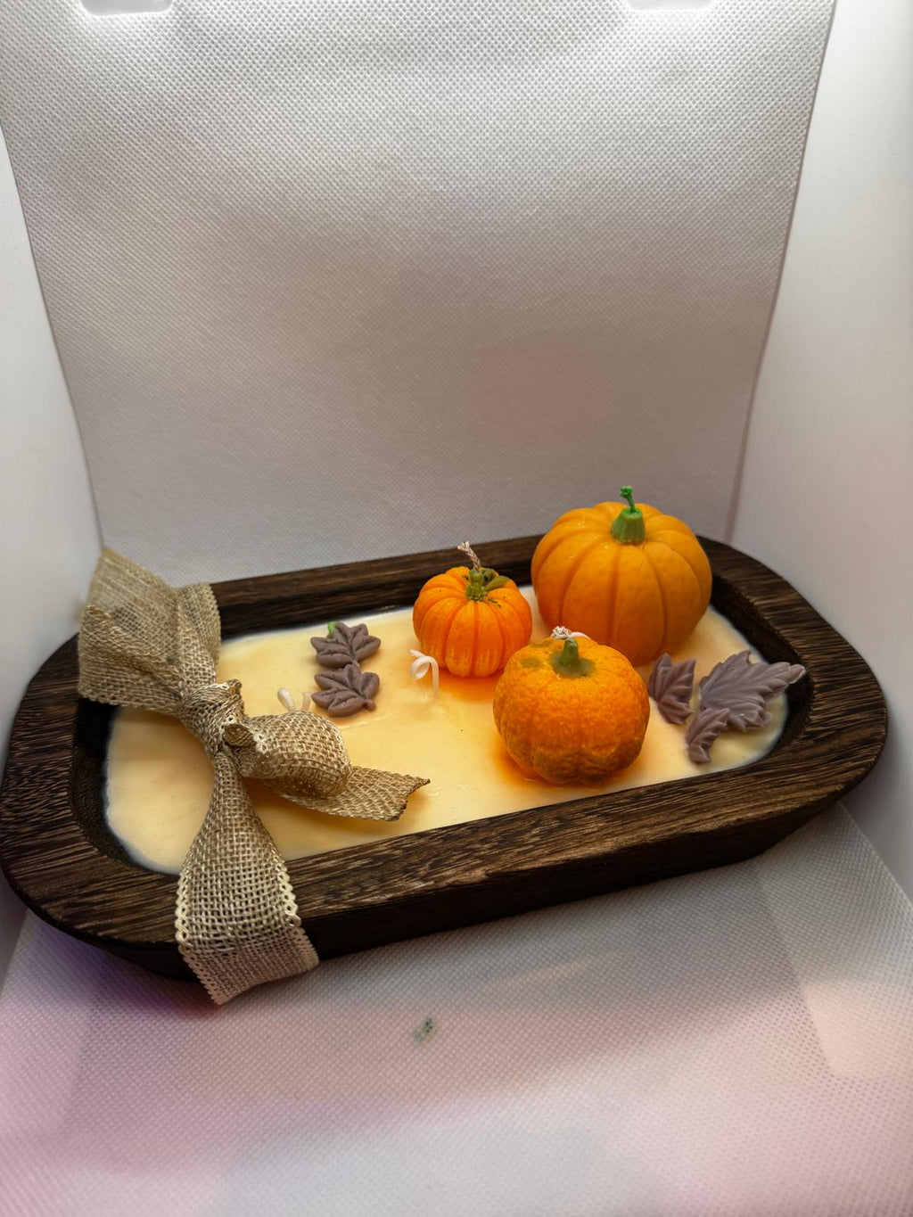 Calabazas en cuenco de madera