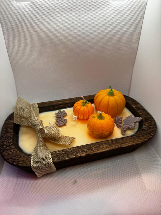 Calabazas en cuenco de madera