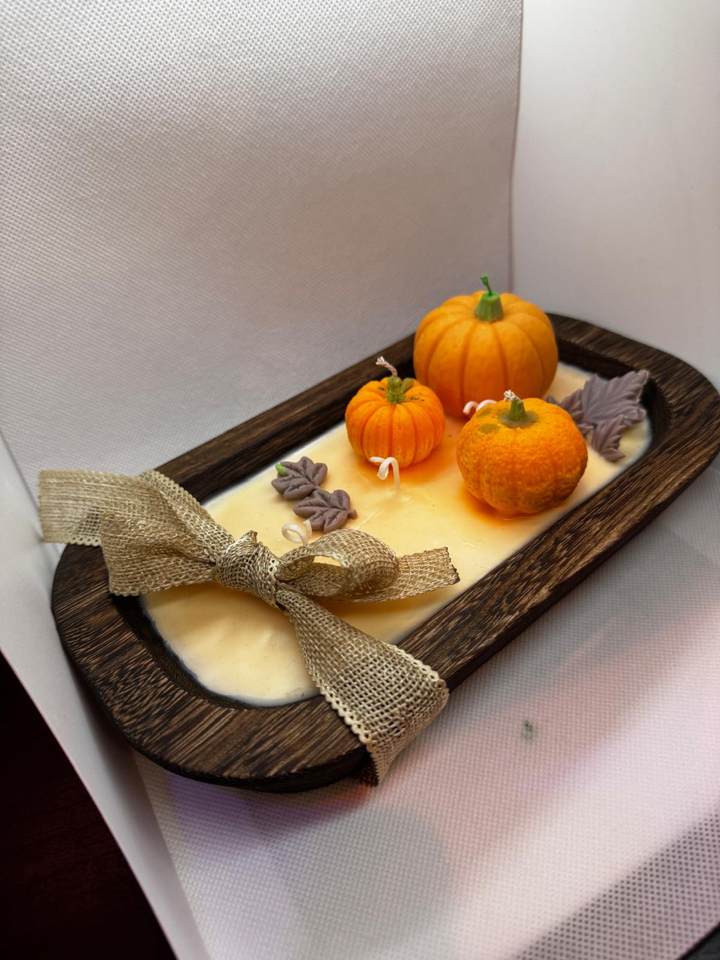 Calabazas en cuenco de madera