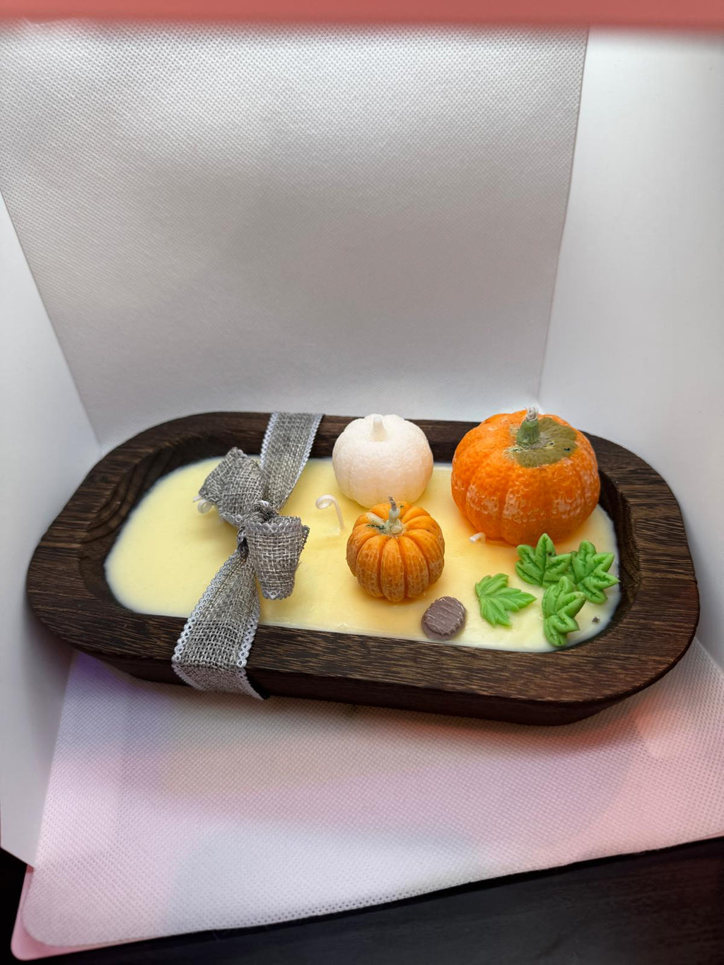 Calabazas en cuenco de madera
