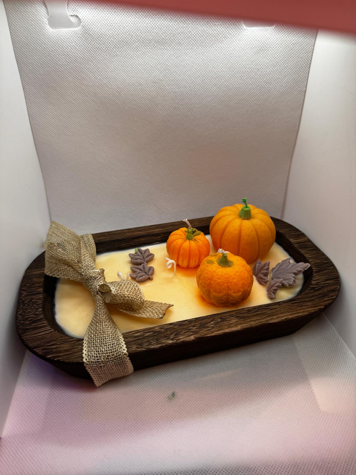 Calabazas en cuenco de madera