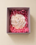 Vela rosa blanca en caja